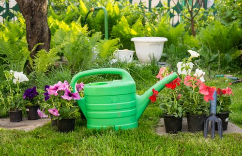 Gardener working in a Dalston terraced garden